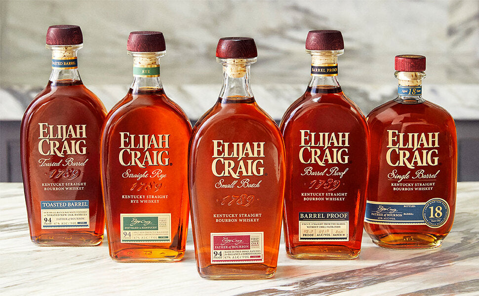 Marble countertop with Elijah Craig family bottles pictured: Toasted Barrel, Straight Rye, Small Batch, Barrel Proof & 18 Year Old.