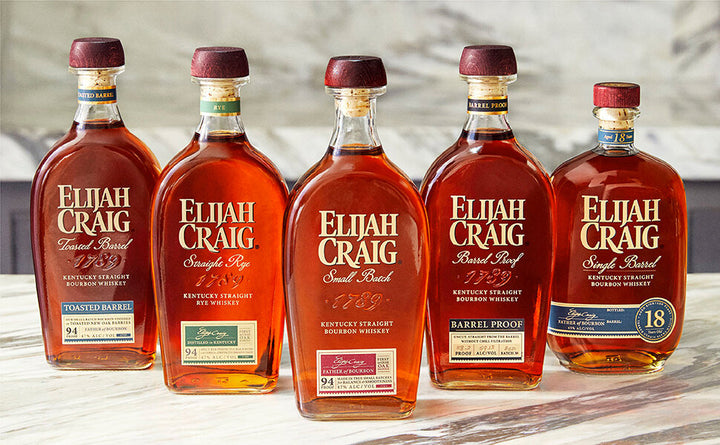 Marble countertop with Elijah Craig family bottles pictured: Toasted Barrel, Straight Rye, Small Batch, Barrel Proof & 18 Year Old.
